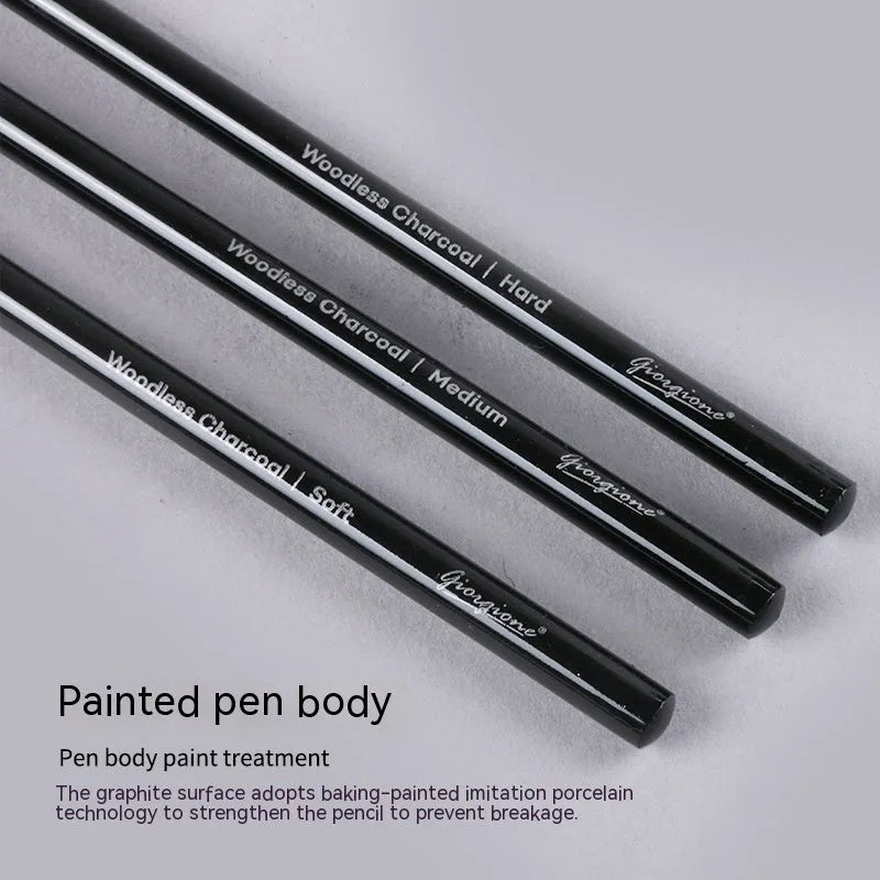 Graphite and carbonised drawing pencil set with wooden shells on suction card packaging