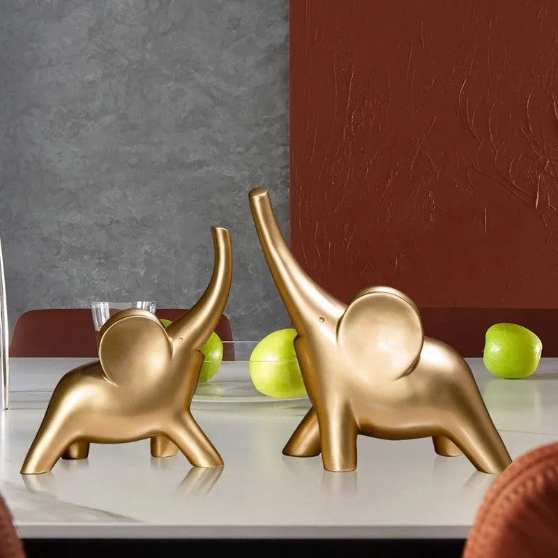 Modern resin fortune elephant ornament in rose gold or white colour, large and small sizes available.