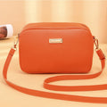 Women's solid colour PU shoulder bag with three-dimensional pocket in urban simplicity design
