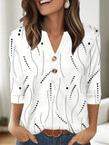 Women's loose fit V-neck casual top with a colourful 3D printed pattern on polyester fabric.