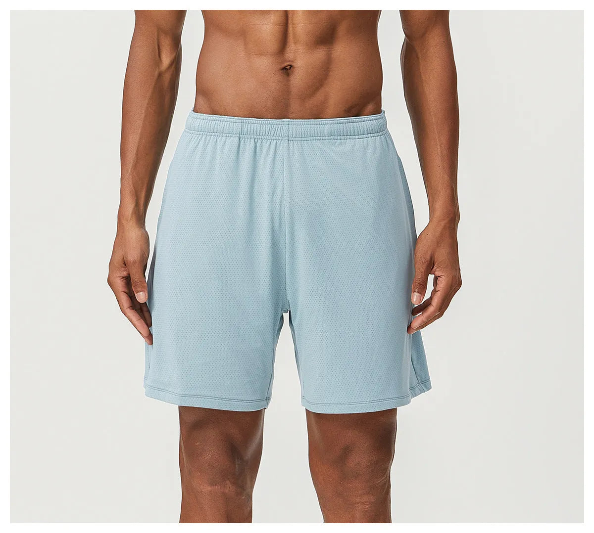 Men's quick-drying double-layer running shorts in khaki colour, showing mid waist and short length design.