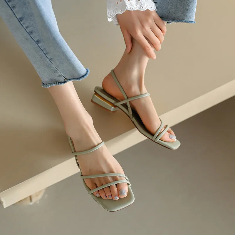 Women's flat open-toed Roman sandals with square toe and microfiber straps in beige, green and white.