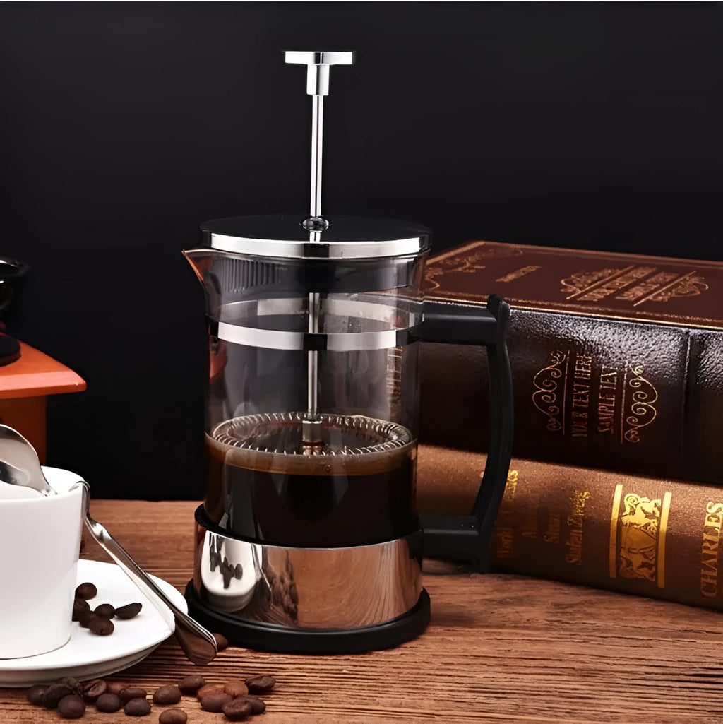 Glass manual coffee maker with stainless steel filter, 350ml capacity, dimensions 10cm by 8cm by 17cm.
