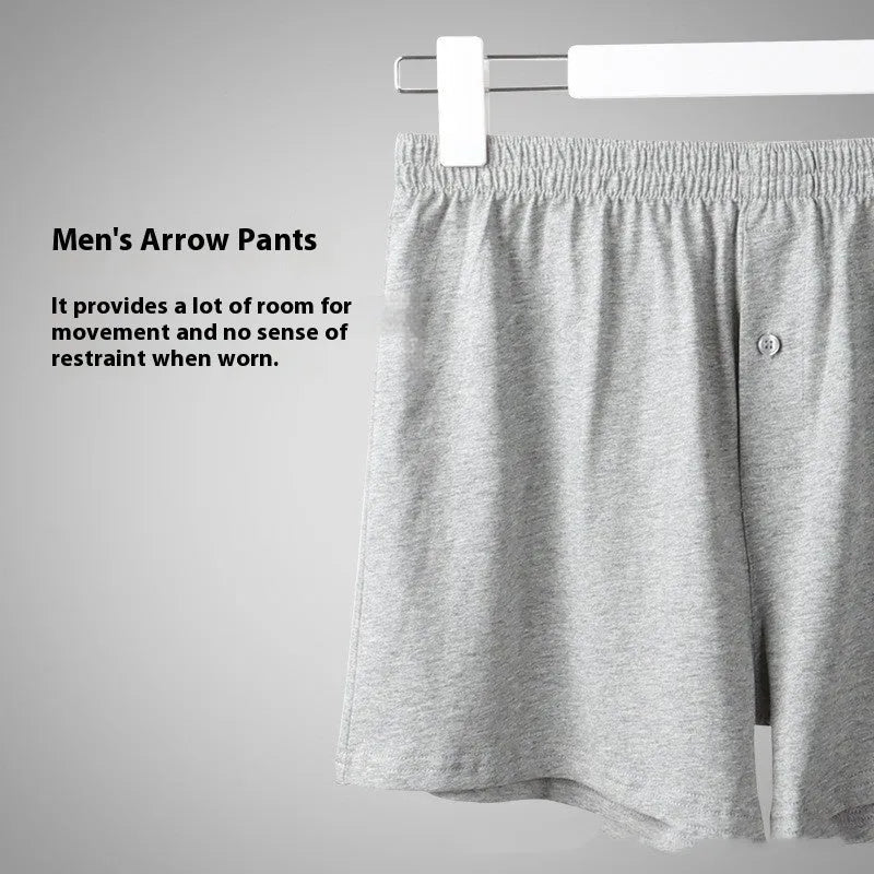 Men's loose-fit pure cotton boxer shorts in light grey, shown laid flat to display high-waist design.
