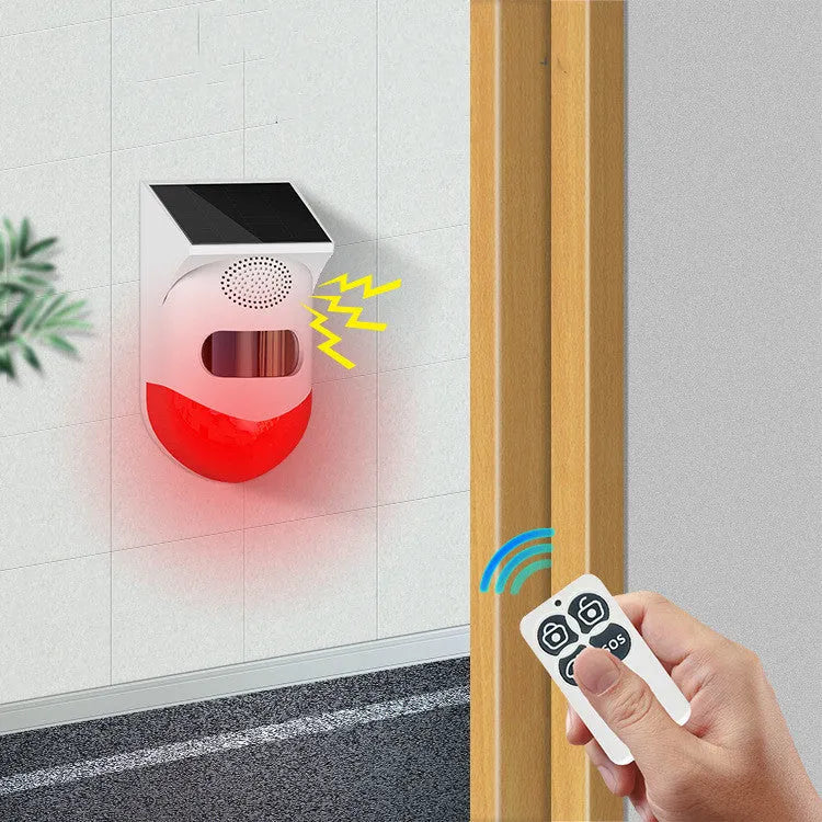 Solar-powered infrared security alarm with wall mount for outdoor property protection