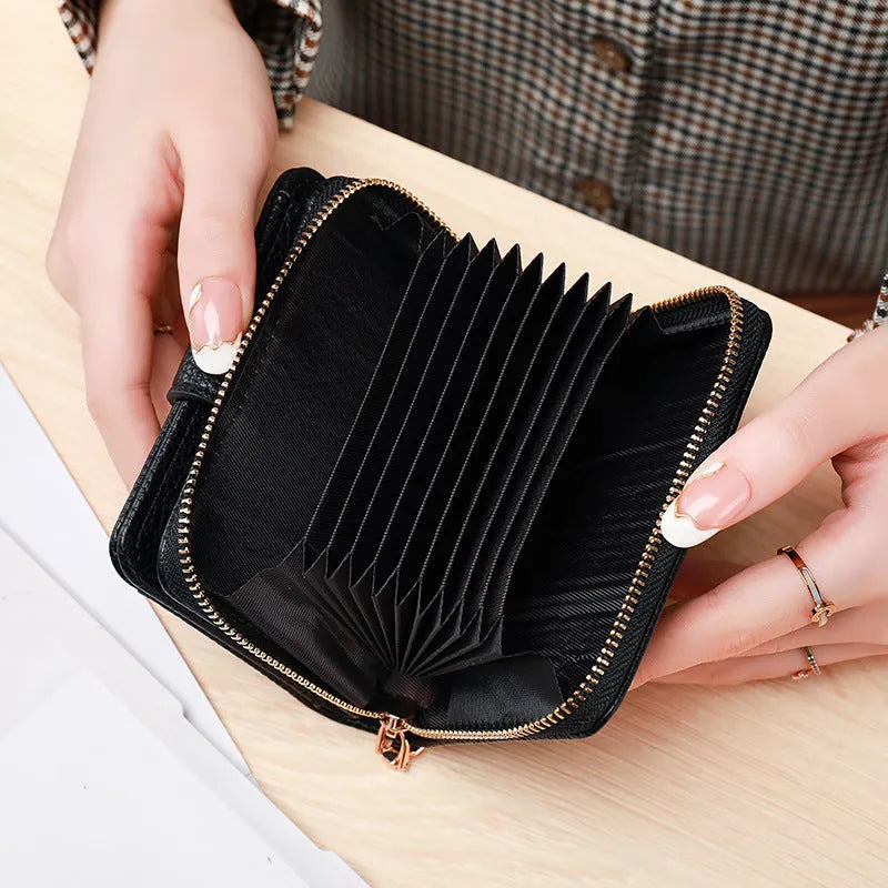 Beige women's short PU wallet with lychee pattern and visible stitching