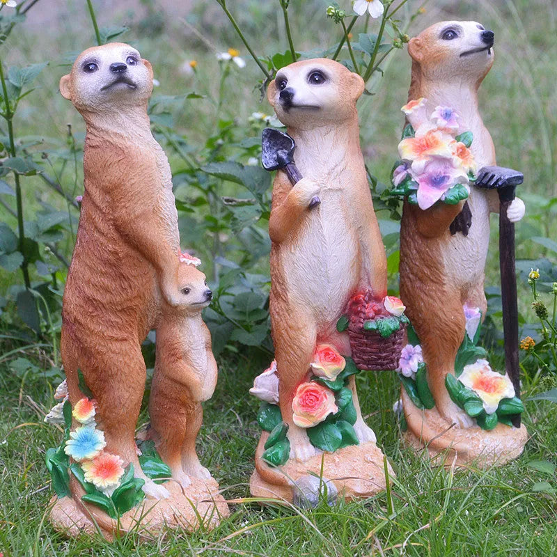 Straw hat mongoose garden ornaments in resin with rake and shovel designs