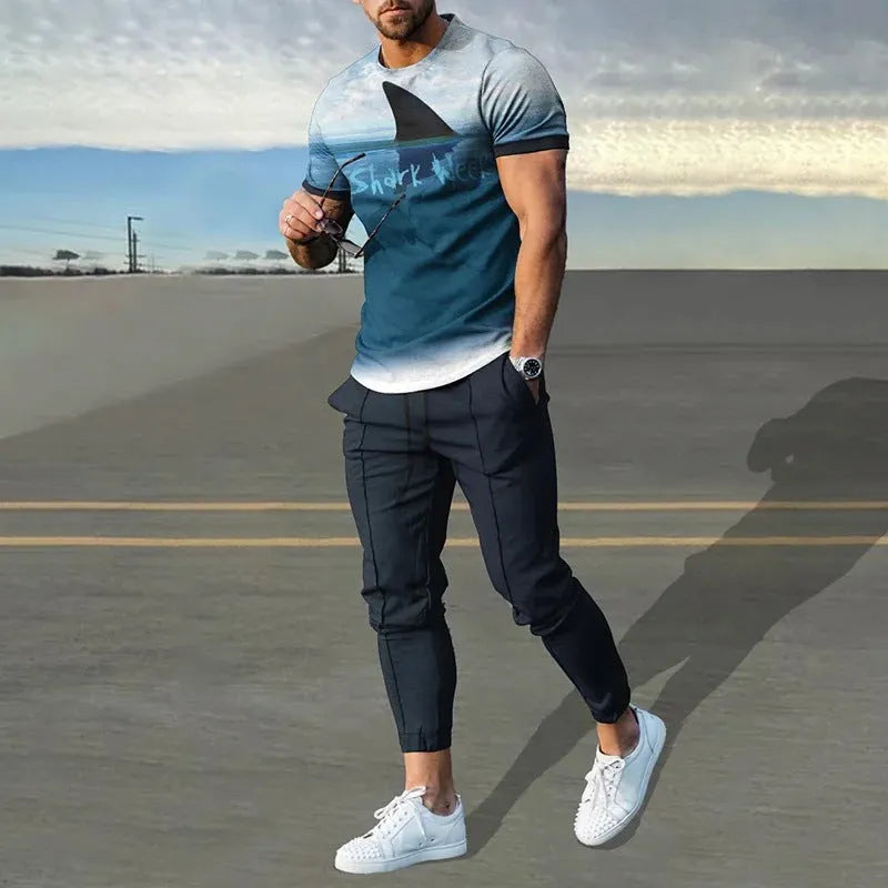 Man wearing a short-sleeved printed pullover and matching trousers from a lightweight polyester sport suit set.