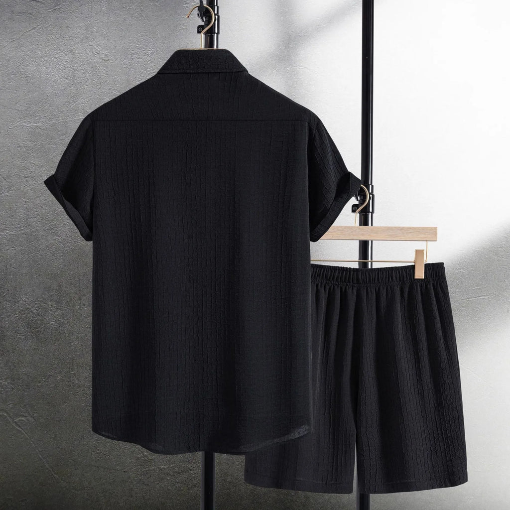 Men wearing black cotton blend jacard short sleeve shirt and matching shorts casual two piece suit