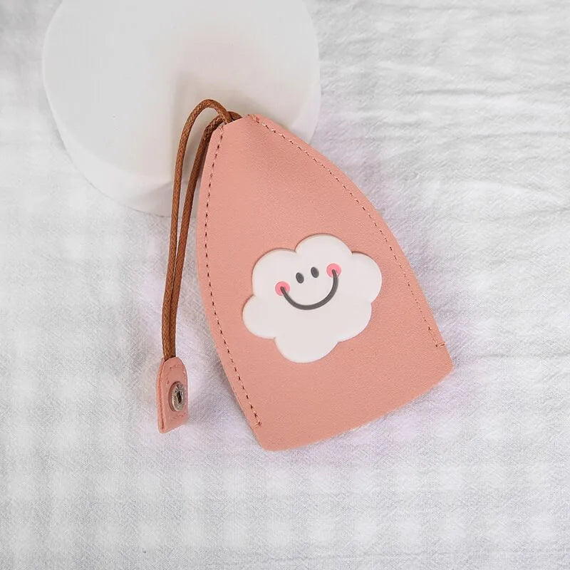 Cartoon PU leather pull-out car key case measuring 14 x 7.5cm with colourful designs