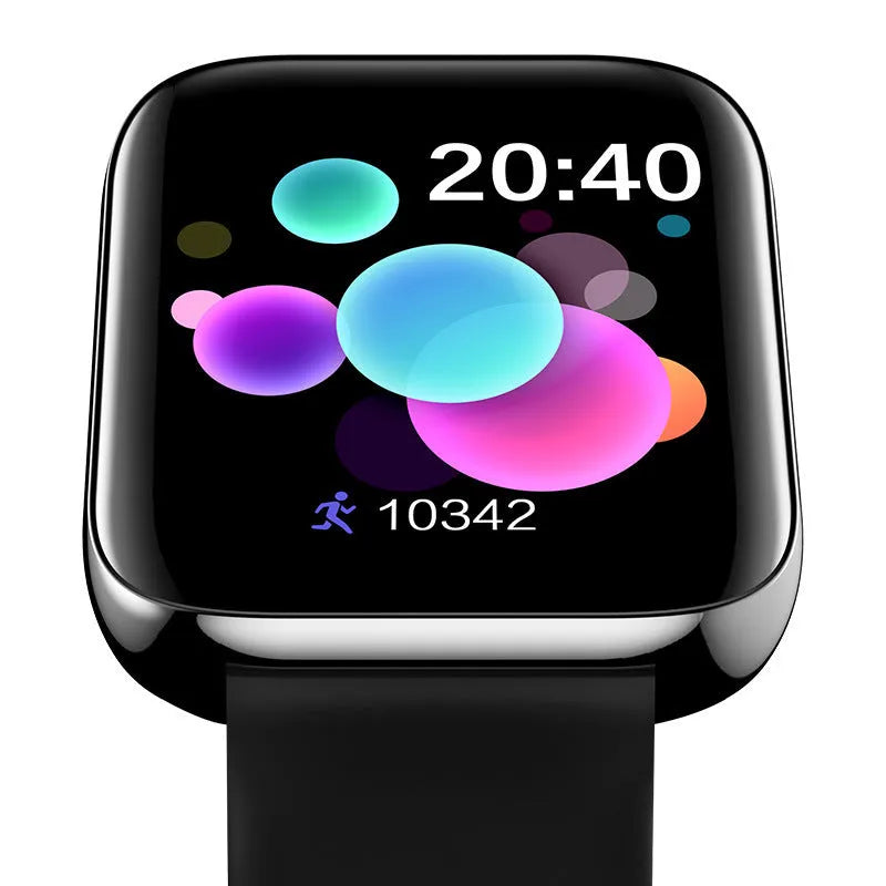 Black smart bracelet with a touch screen displaying blood pressure data on a silicone wrist strap.