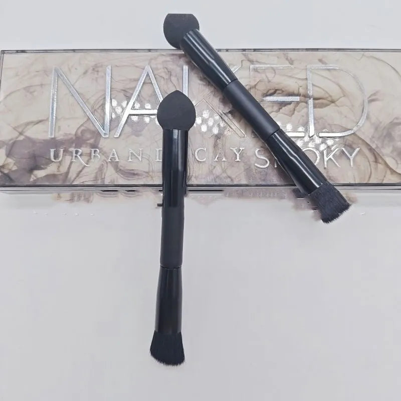 Black concealer brush with wooden handle and sponge stick tip for under-eye application