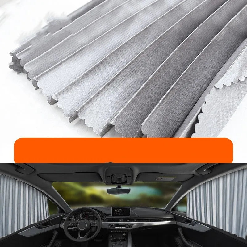 Retractable car sun curtain extended across windscreen with roller shutter mechanism visible.