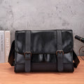 Black Korean style men's anti-theft backpack with PU construction and decorative sewing thread details