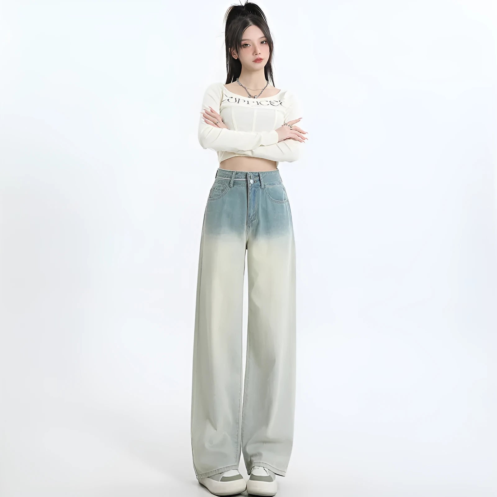Gradient blue women's straight-leg wide-cut denim trousers laid flat