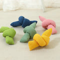 White knotted cotton rope dog toy for chewing and tug-of-war play.