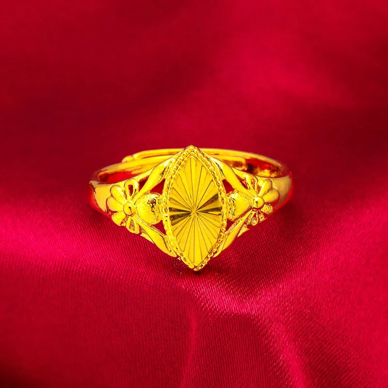 Gold electroplated brass ring with open diamond flower geometric design and textured elements for women