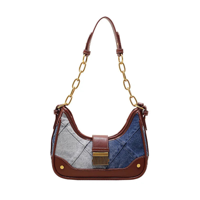 Brown denim women's shoulder bag with diamond mesh pattern and chain detail showing bucket shape
