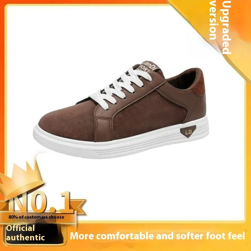 Men's black snake pattern leather low-top sneakers with round toe and flat rubber sole.