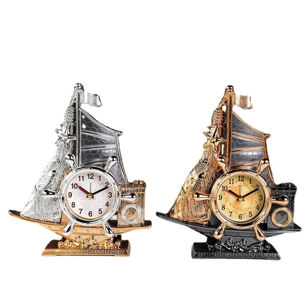 Gold or silver fashionable bedroom alarm clock on a bedside table.
