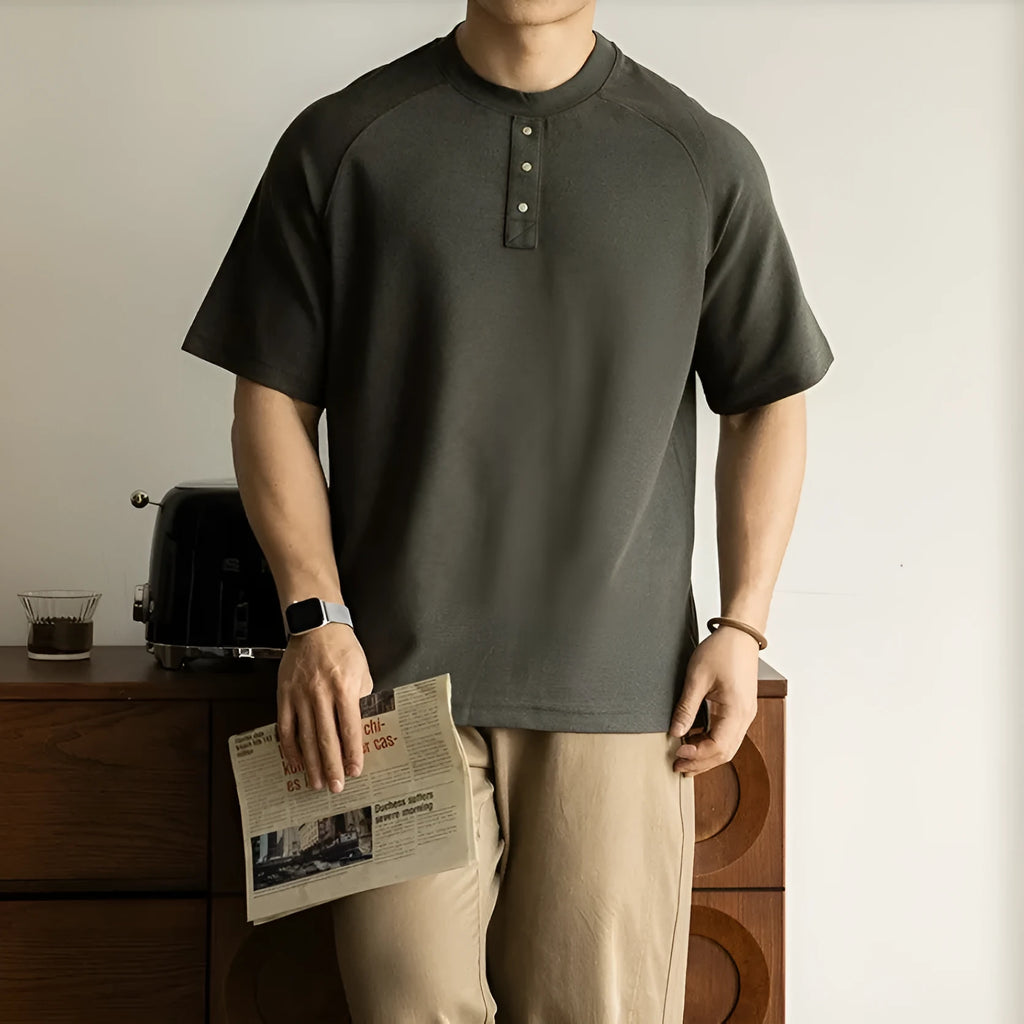 Casual loose pullover top with terry texture fabric and raglan sleeves in smoky grey colour