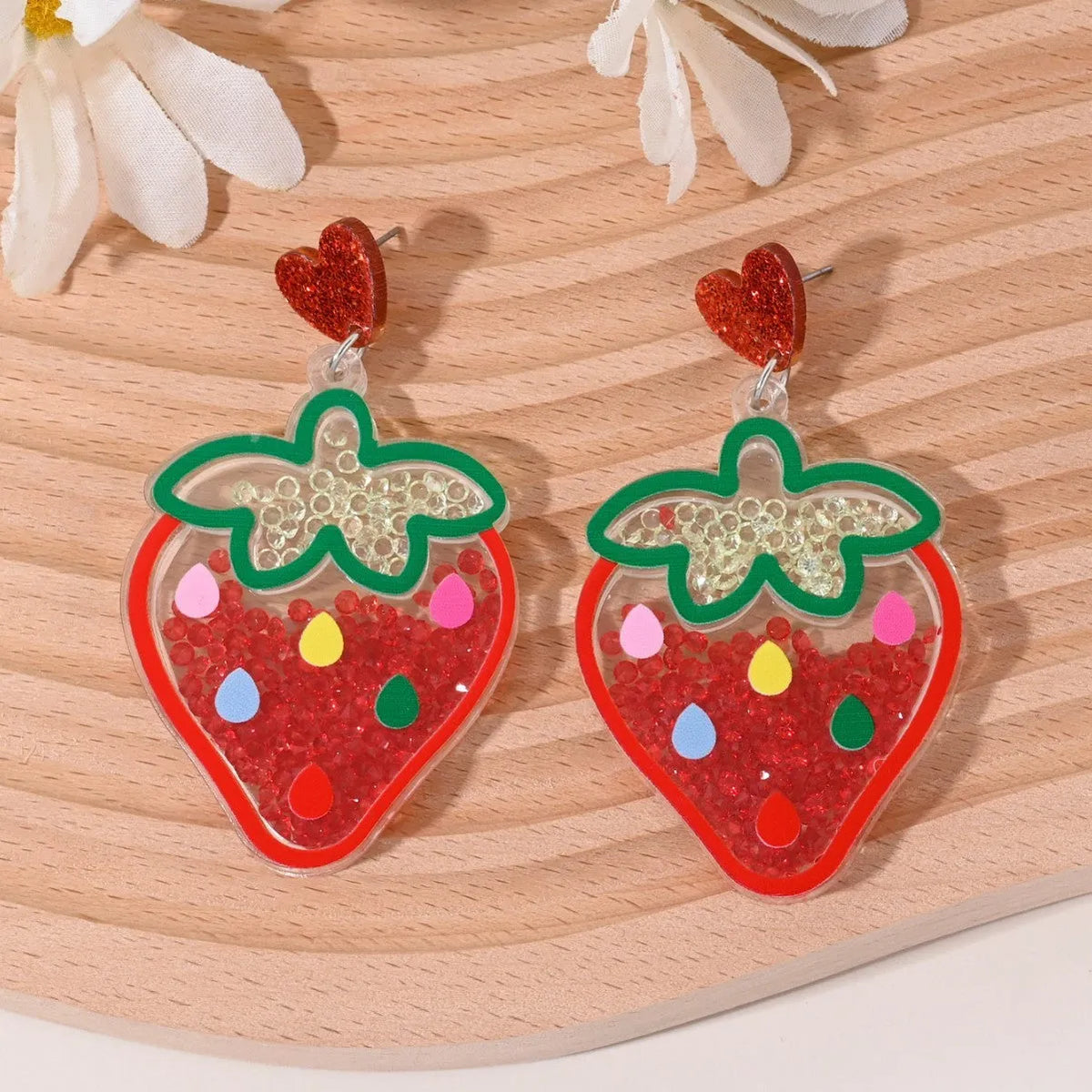 Colourful acrylic earrings shaped like cherry, strawberry, watermelon, pineapple, coconut tree, cake, and ice cream