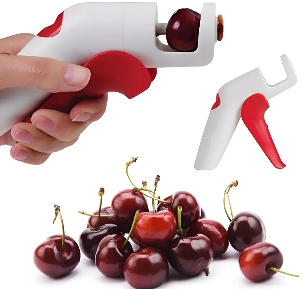 Stainless steel cherry pitter kitchen gadget with soft grip handles for removing stones from fruit.