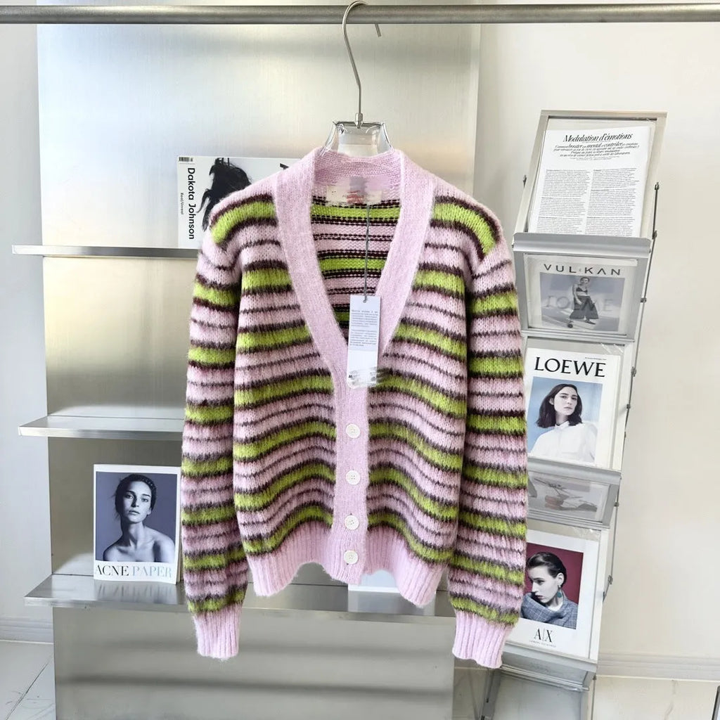 Pink women's wool cardigan sweater with contrast detail, shown in round neck and open cardigan styles