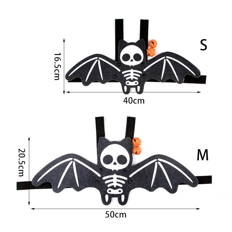 Halloween batwing cloak costume for a cat, made from black and orange felt.