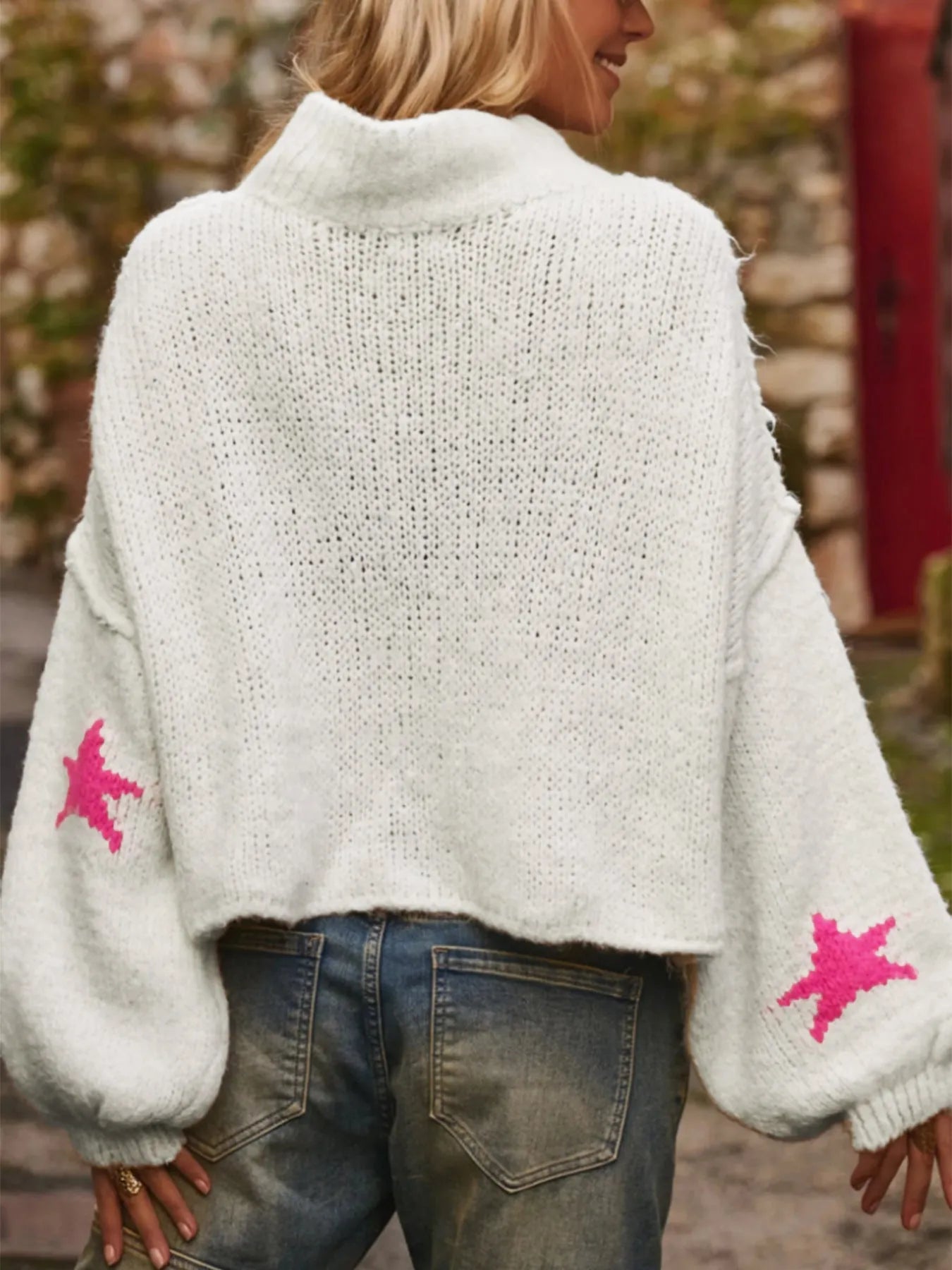 White women's turtleneck pullover with contrast star pattern on imitation velvet fabric