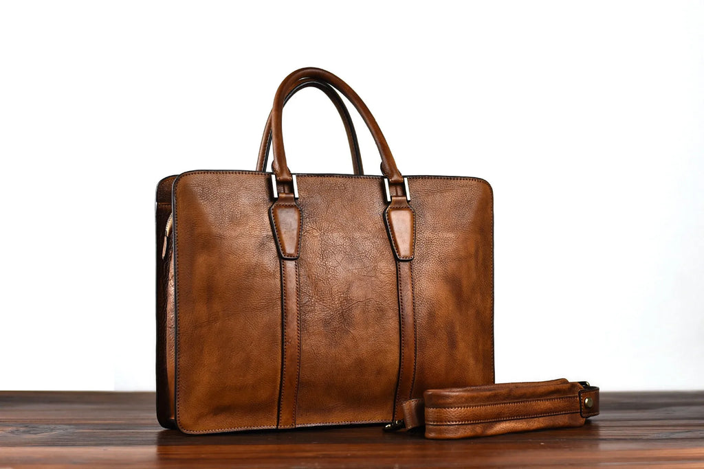 Men's brown leather business handbag with square horizontal shape and top zipper opening