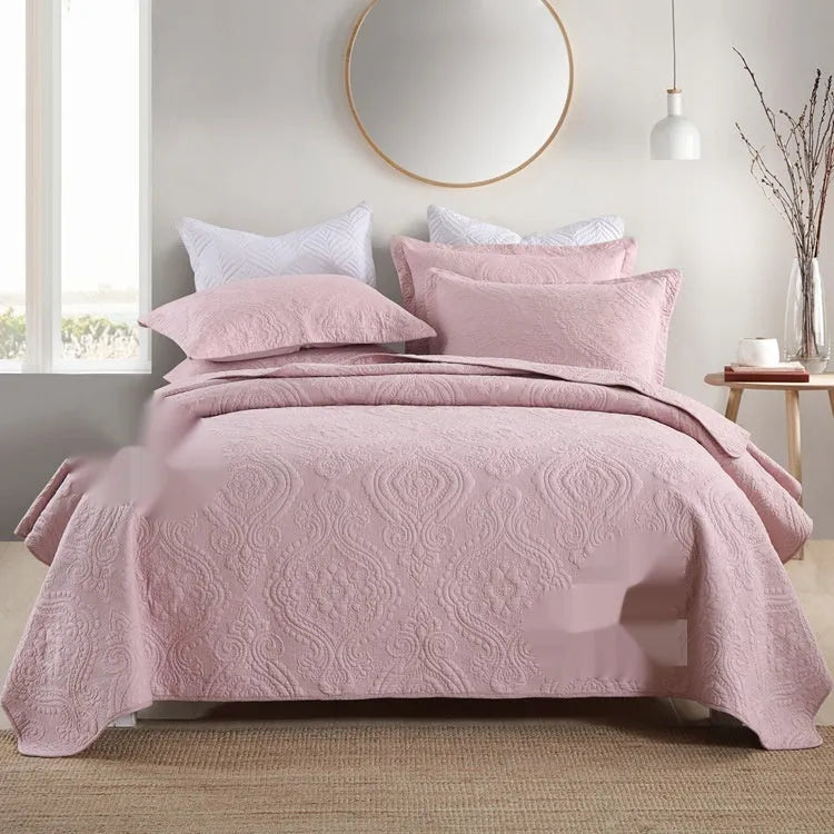 Pure cotton bedding set with damascus pattern showing embroidery details and quilted finish on bed