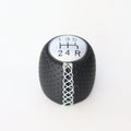 Black perforated leather-style gear shift knob for Alpha car on a 5-speed pattern matte cover.