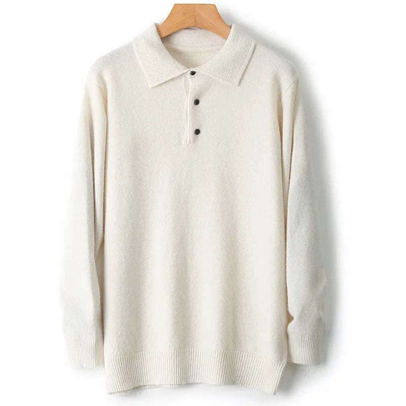 Men's woollen polo collar pullover sweater in a neutral colour showing long sleeves and textured collage stitching.