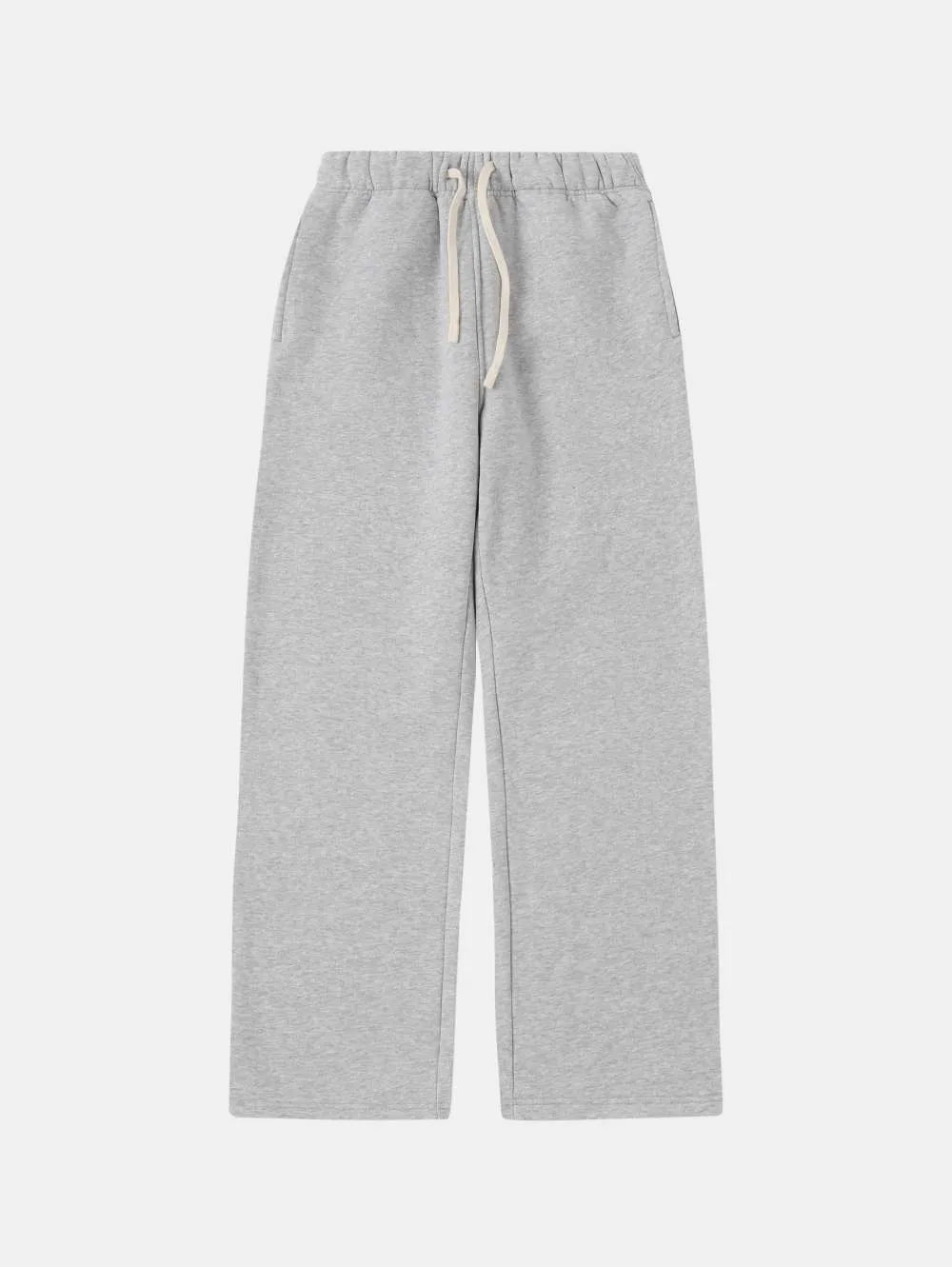 Man wearing grey fleece-lined sweatpants with a drawstring waistband