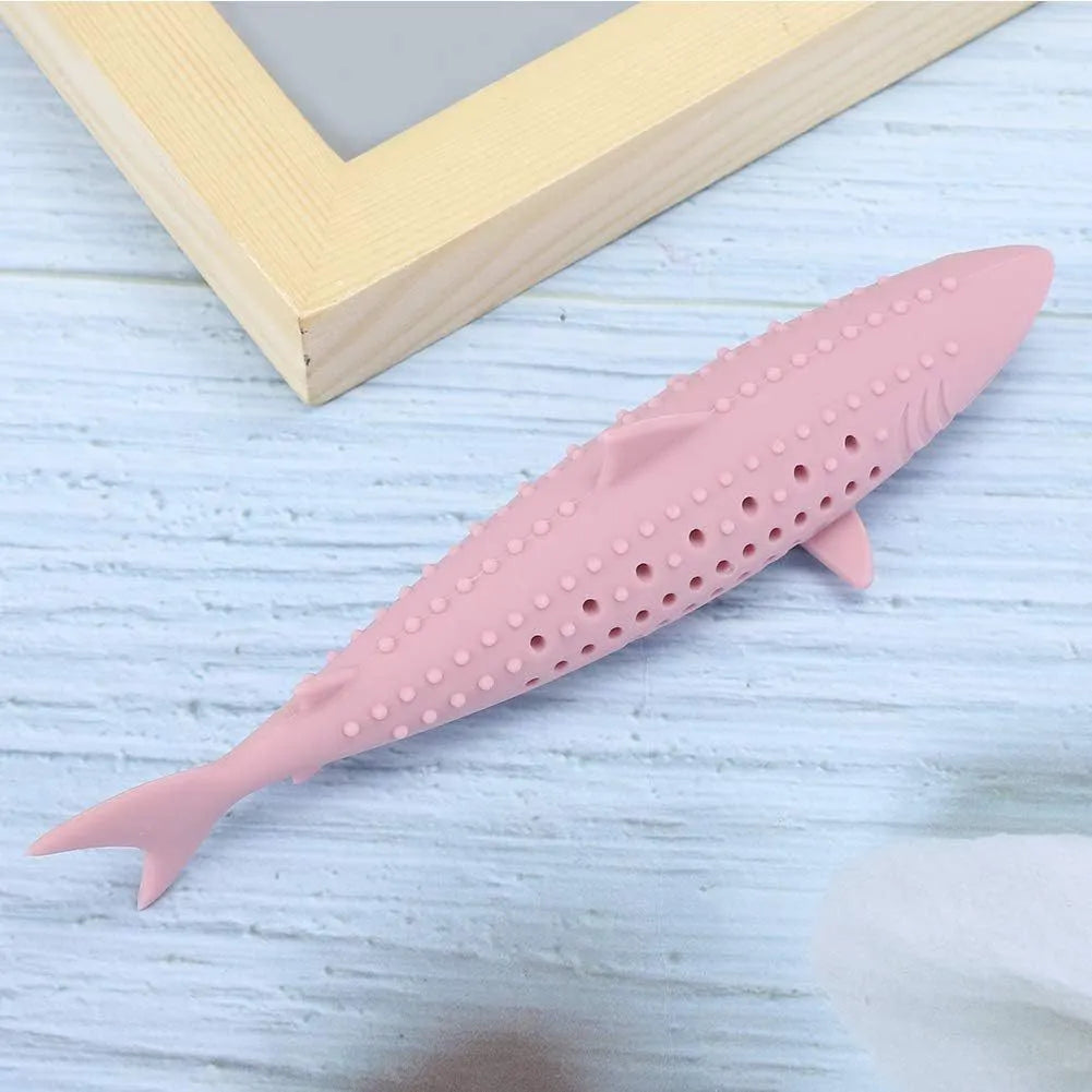 Green silicone fish-shaped chew toy for cats with breathable side holes on a white background.