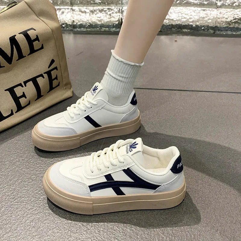 Women's blue and brown casual sports shoes with artificial PU leather upper and front lace-up fastening