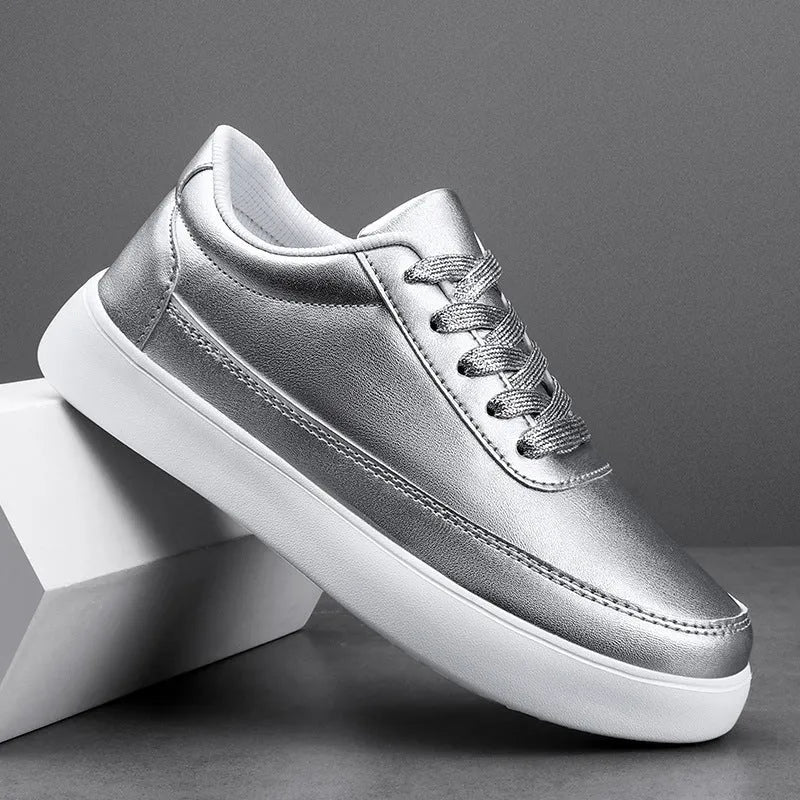 Women's white leather lace-up casual flat shoes on a light background.