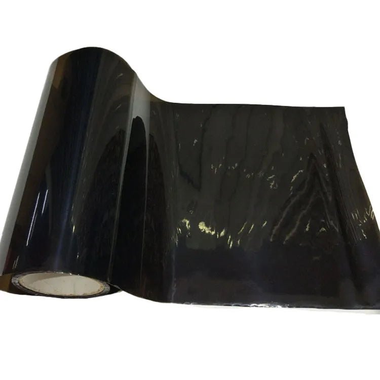 Roll of 30cm wide car lamp protective film for large LED lampshades, showing material samples.