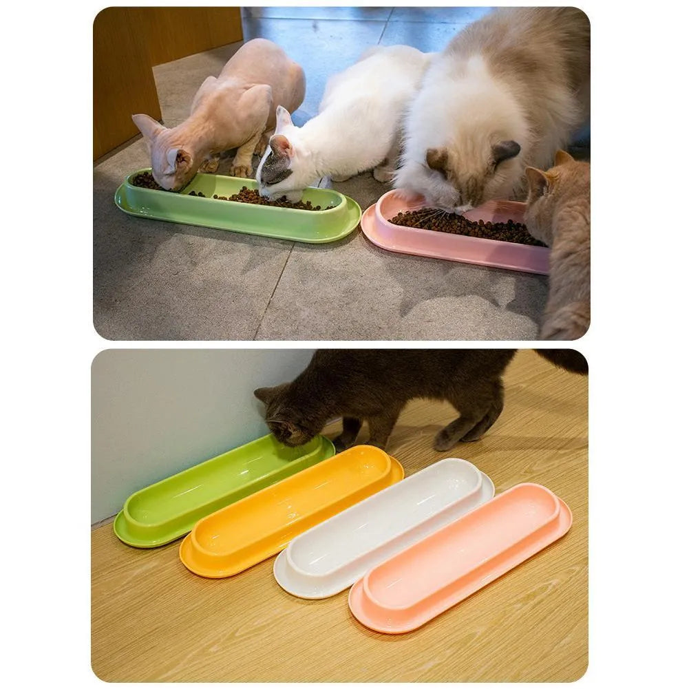 Green, pink, and yellow leakproof plastic pet food and water bowls for multiple kittens or puppies.