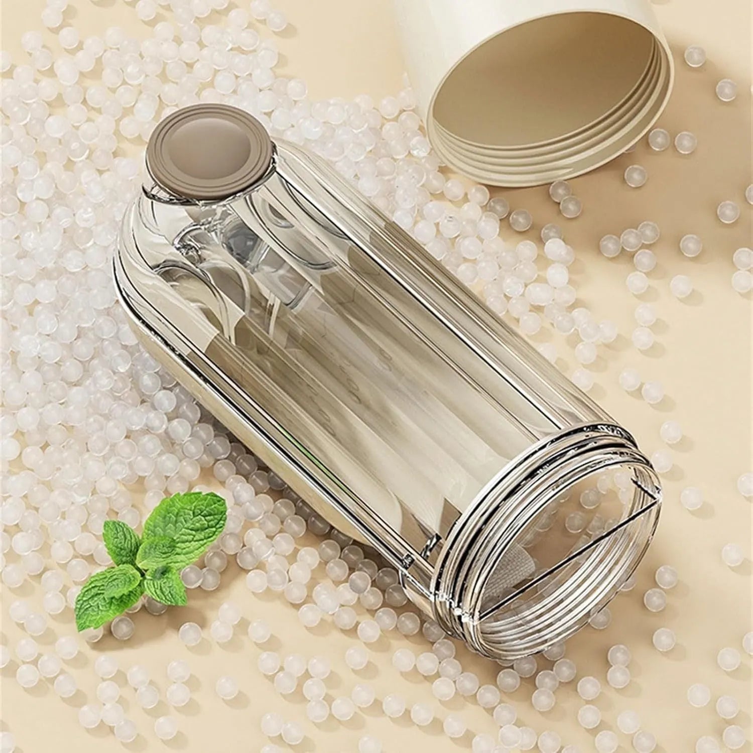 Beige foldable dog water bottle with food container at base, shown extended and collapsed.