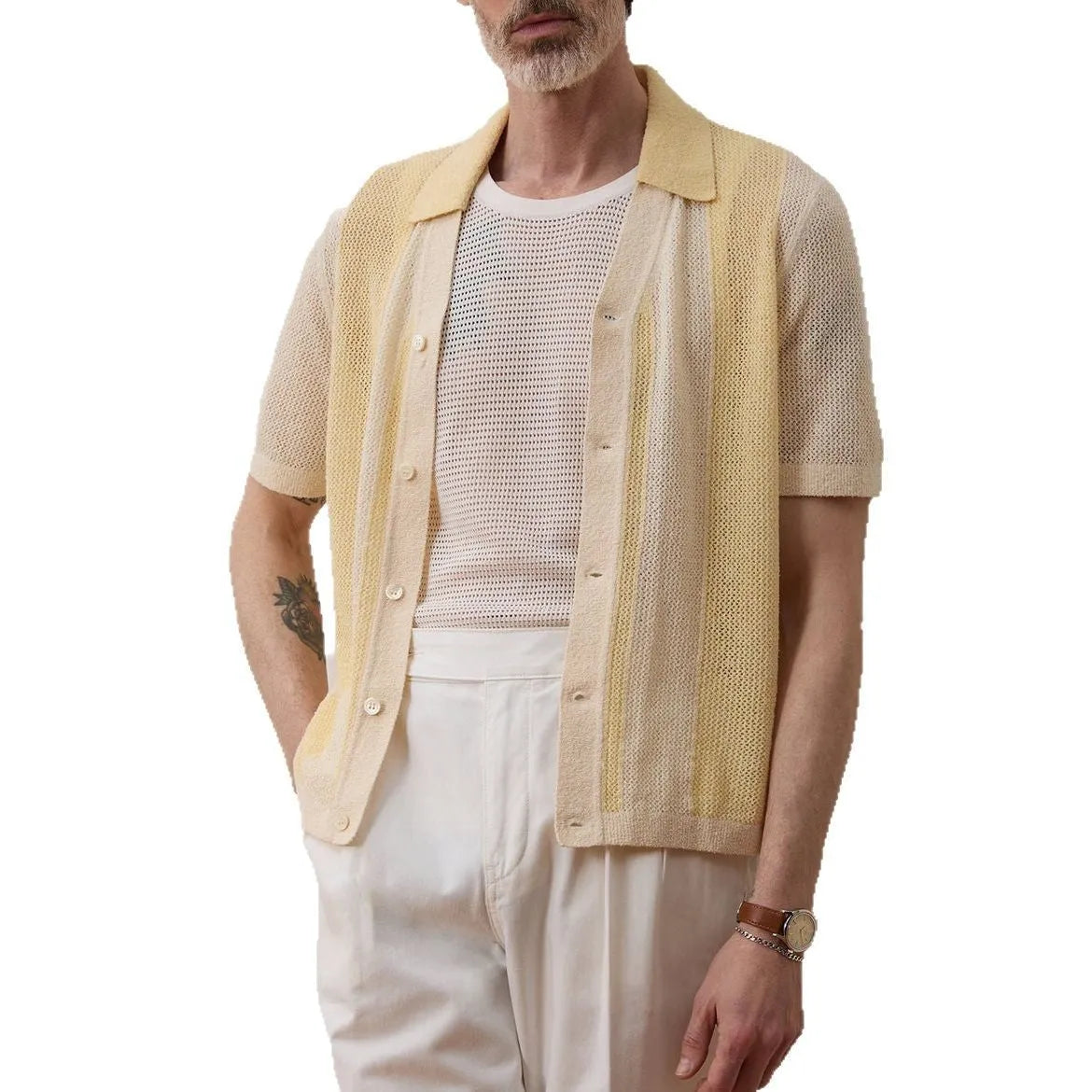 A bright yellow men's short-sleeved polo shirt with hollow-out asymmetric patterning on a casual model.