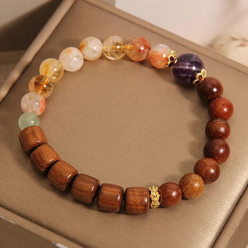 Women's bracelet with yellow tower crystal, ebony amethyst beads, pearl and rhinestone accents