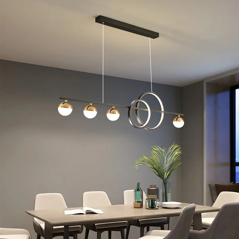 Rectangular black aluminium LED ceiling light with remote control on a white ceiling