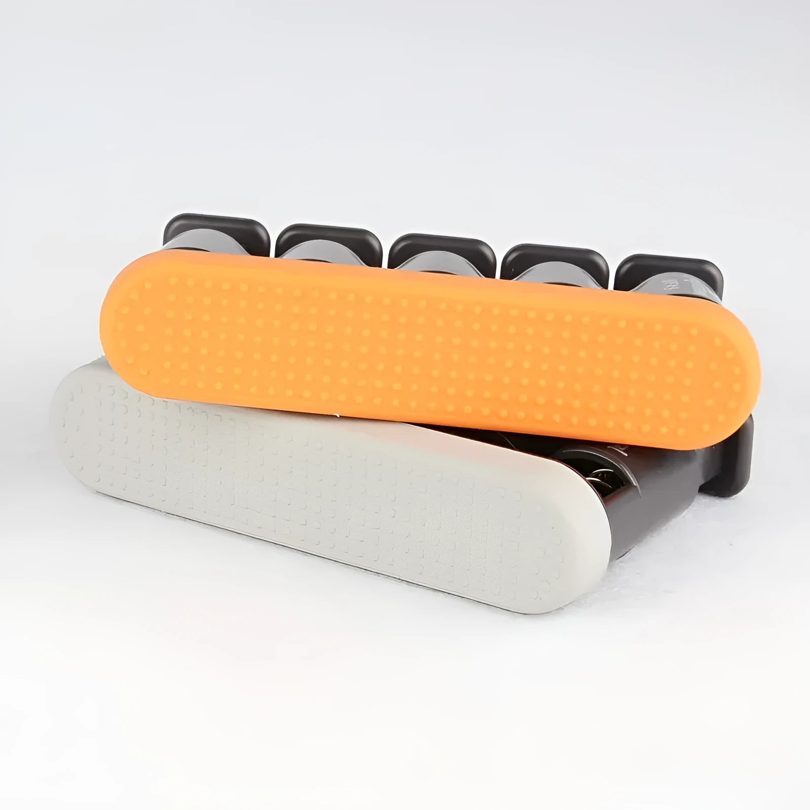 Grey and orange non-slip silicone finger trainer for musicians and climbers