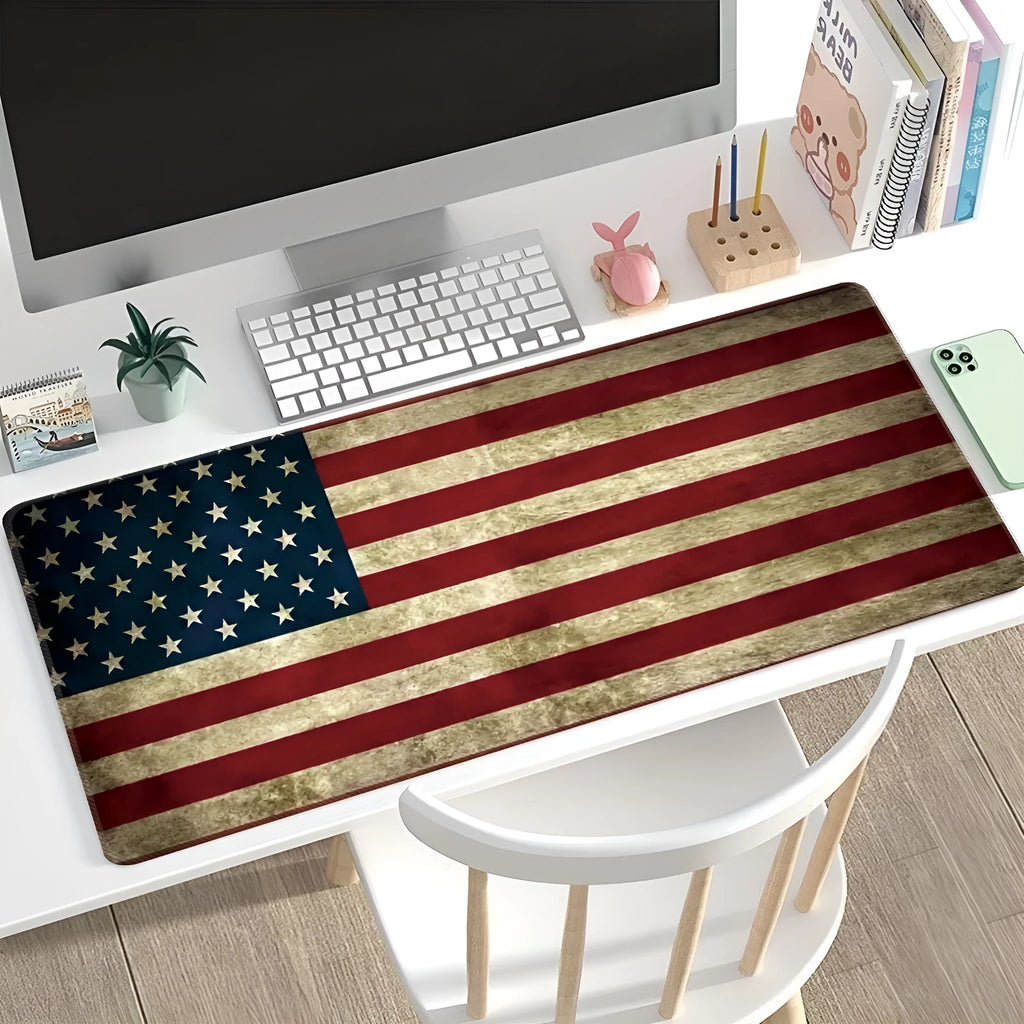 Large rectangular desk mouse pad with printed geometric pattern on a natural rubber non-slip base.