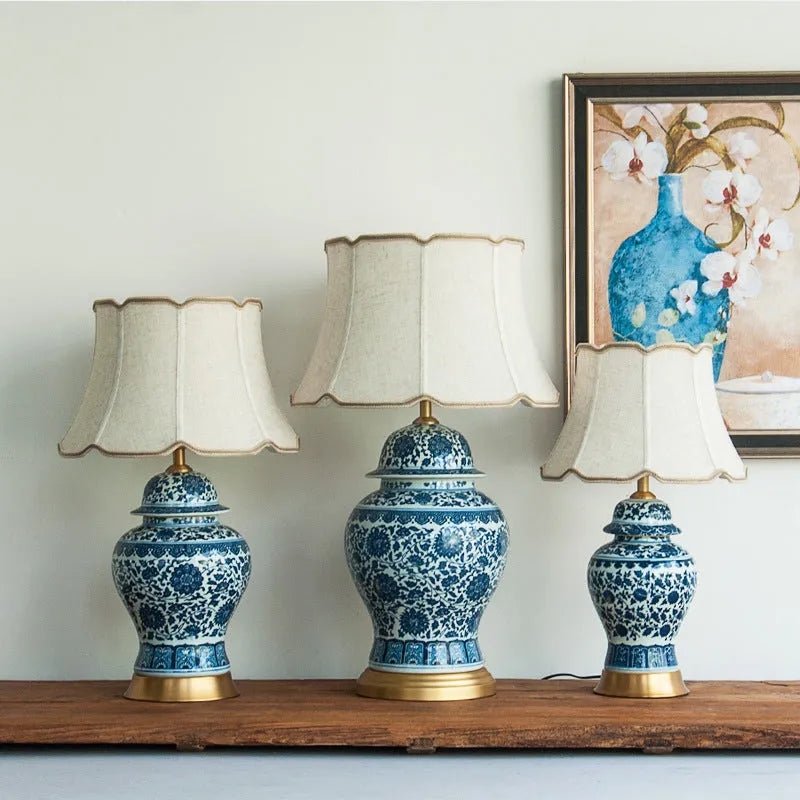 Blue and white porcelain Chinese style table lamp with ceramic base and cloth shade.