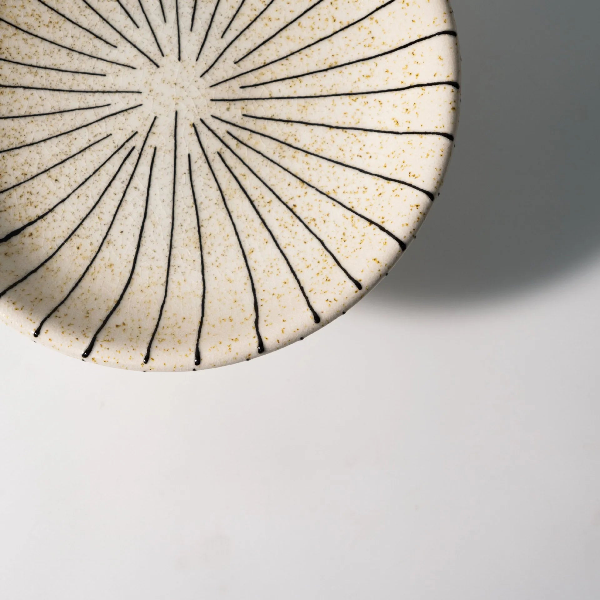 Black and white striped retro synthetic resin fruit plate ornament.