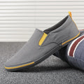 Men's low top canvas casual shoes with rubber vulcanised sole in grey, black orange, or khaki