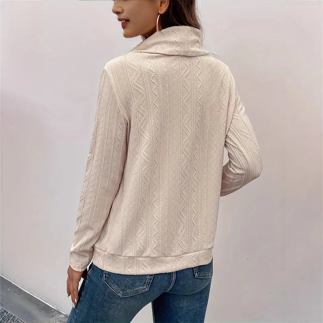 Apricot coloured long sleeve hooded pullover sweater with drawstring adjustment